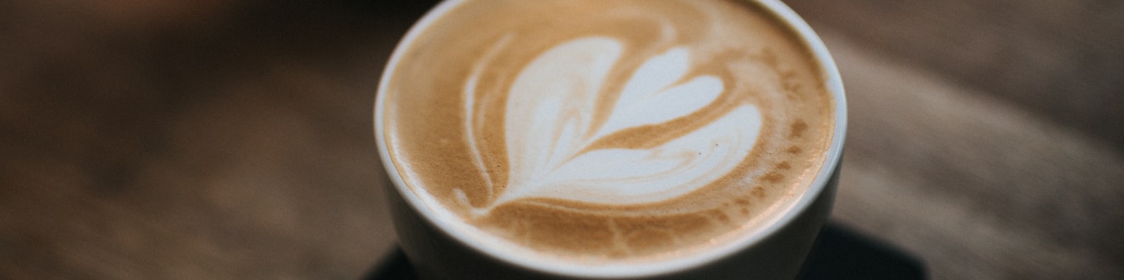 Abstract LinkedIn Cover Photo with Cappuccino With Art Design In Ceramic Cup