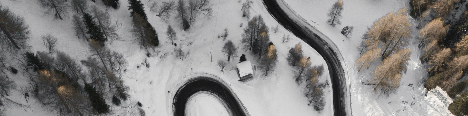 Nature LinkedIn Cover Photo with Aerial View Of Road In The Middle Of Snow