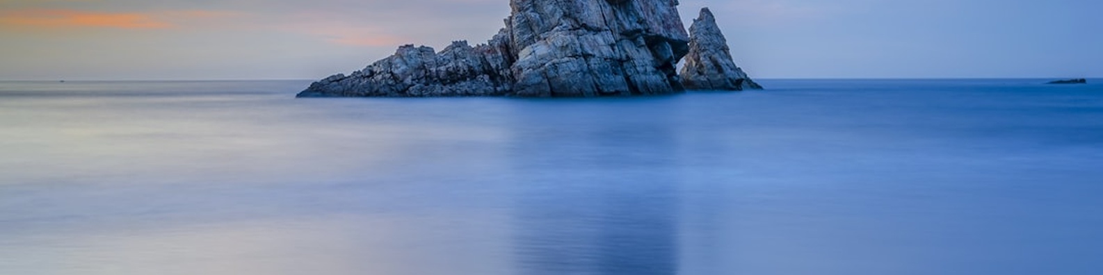 Nature LinkedIn Cover Photo with Sunset over Asturian Beach