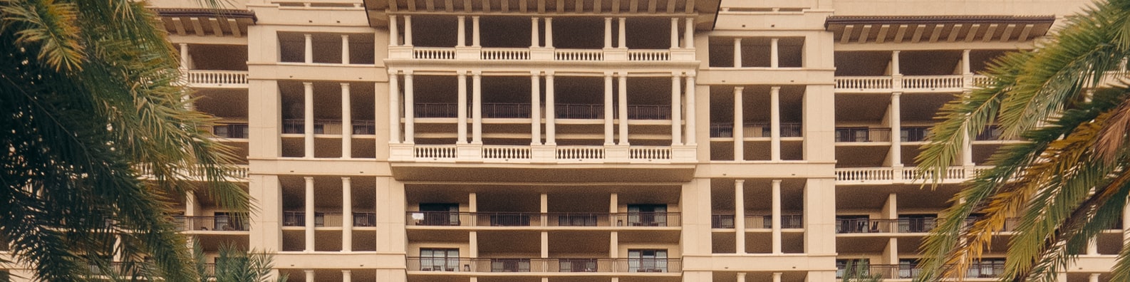 Urban LinkedIn Cover Photo with White Concrete Building With Pillars